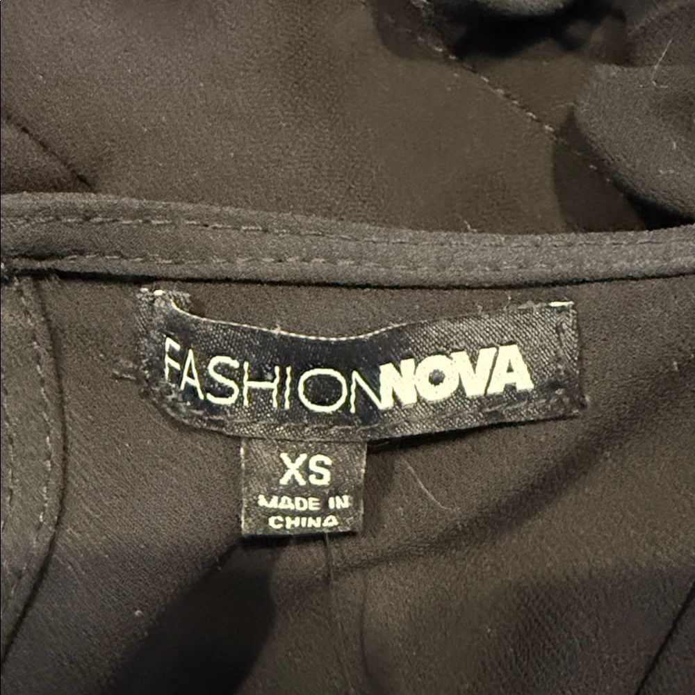 Fashion Nova Elegant Black Jumpsuit.  Open back - Picture 5 of 13